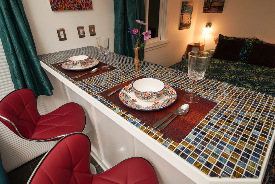 This special countertop is great space for a lot of things, inlcuding workspace or enjoying a meal.