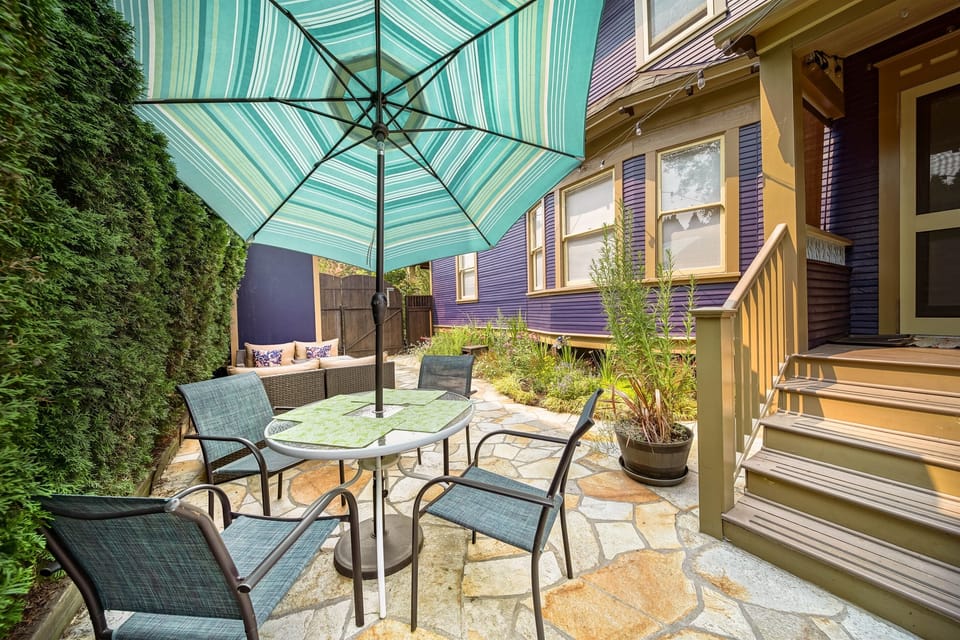 Enjoy Outdoor dining for four on the patio.