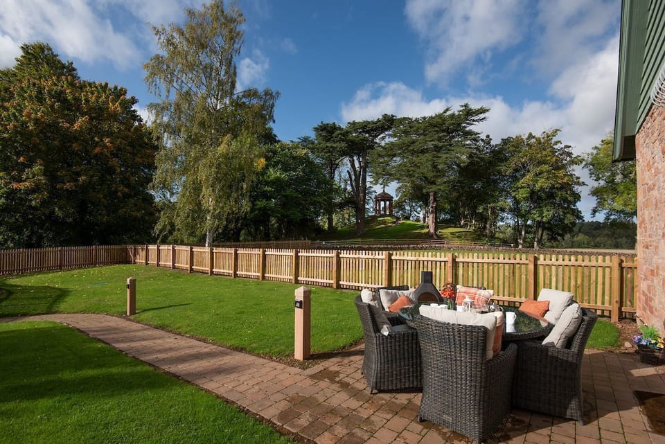Dryburgh Steading Four - the immaculate garden with outside seating