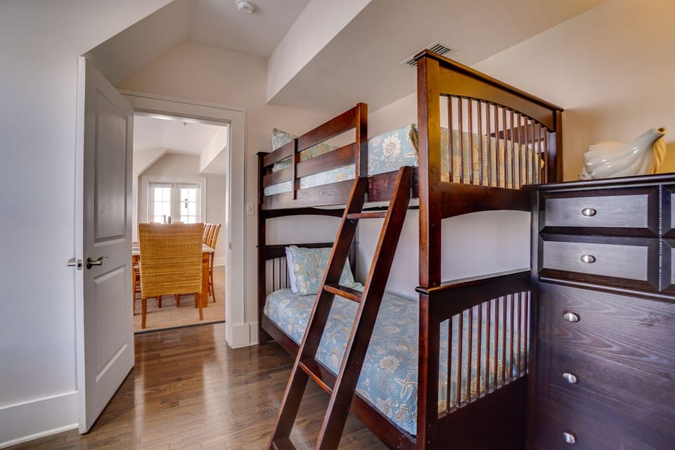 Your kids will love these sturdy wooden bunk beds, complete with built-in storage drawers for all their vacation treasures.