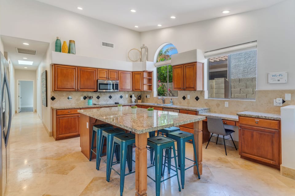 Great open concept! Built in desk/chair is along the side wall - convenient!