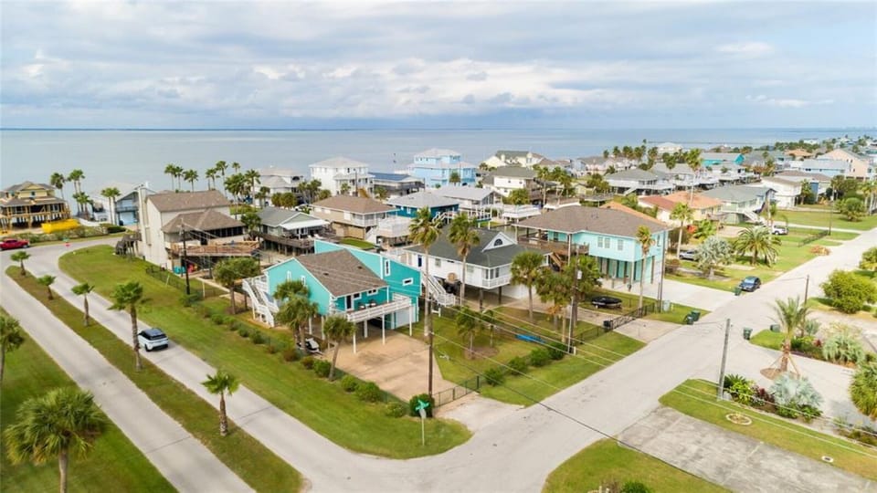 Street view w/ bay in background. Bahama Breeze is on a quiet, dead-end street.