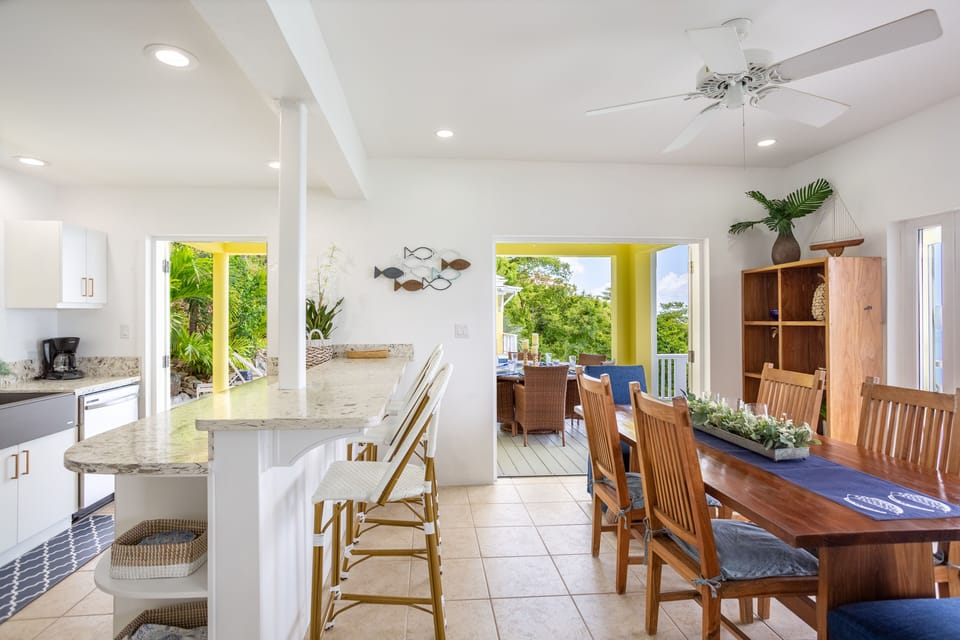Living and dining areas are breezy and open so everyone can help
