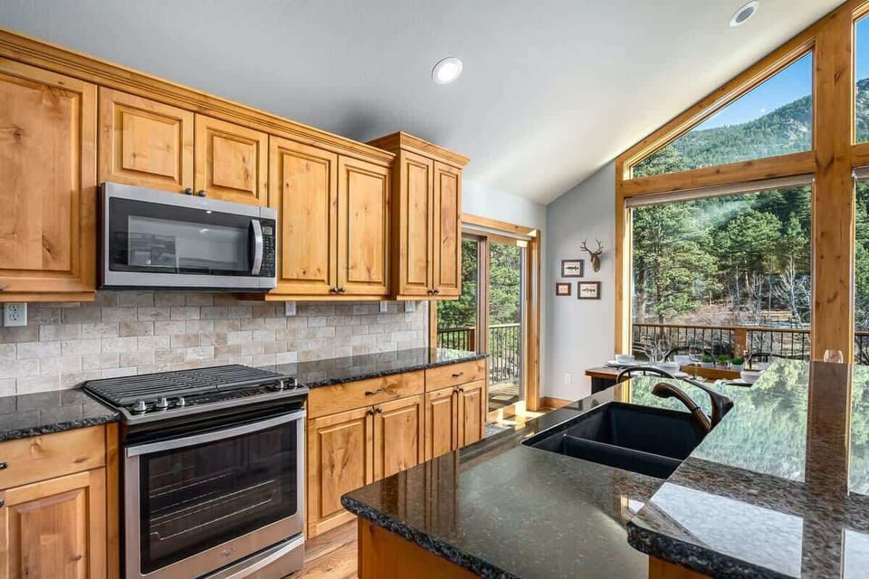 Gas stove top and oven with microwave.