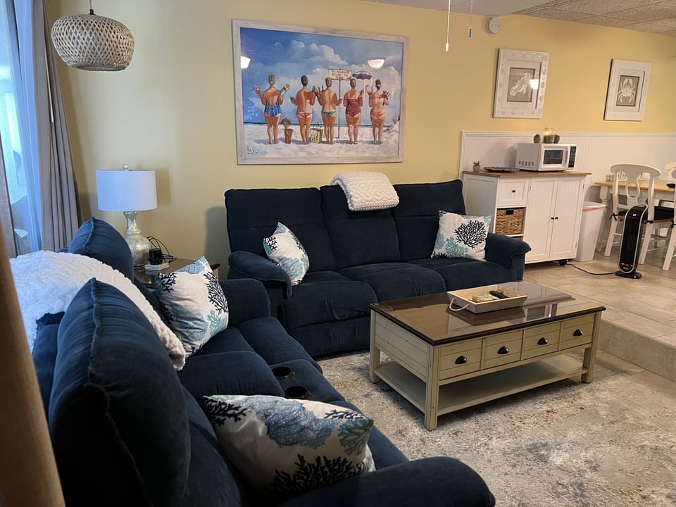 Living area with reclining couches.