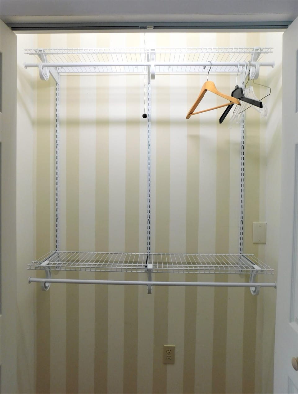 Full closet off downstairs bedroom. 