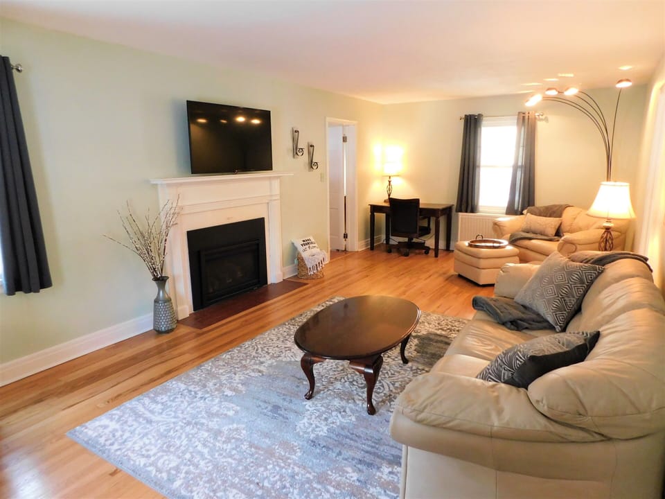 Living room with gas fireplace. 