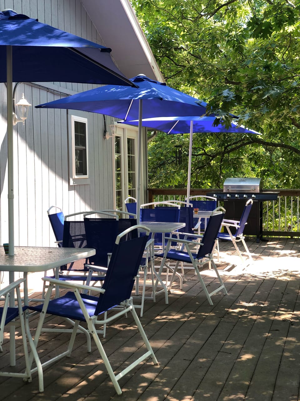 Spacious deck with plenty of seating for outdoor dining 