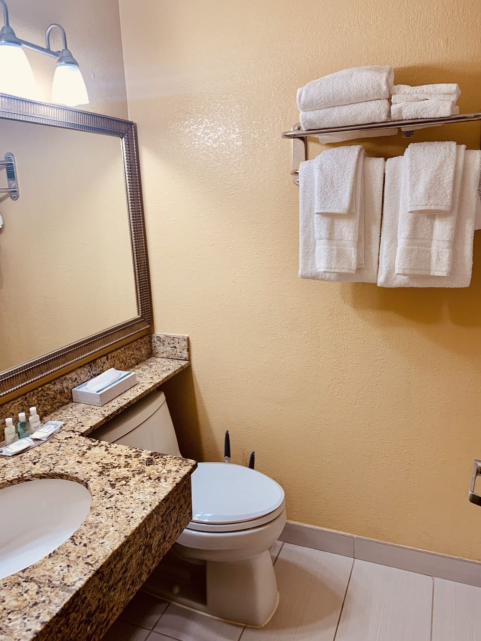 Combined shower/tub, hair dryer, towels, soap
