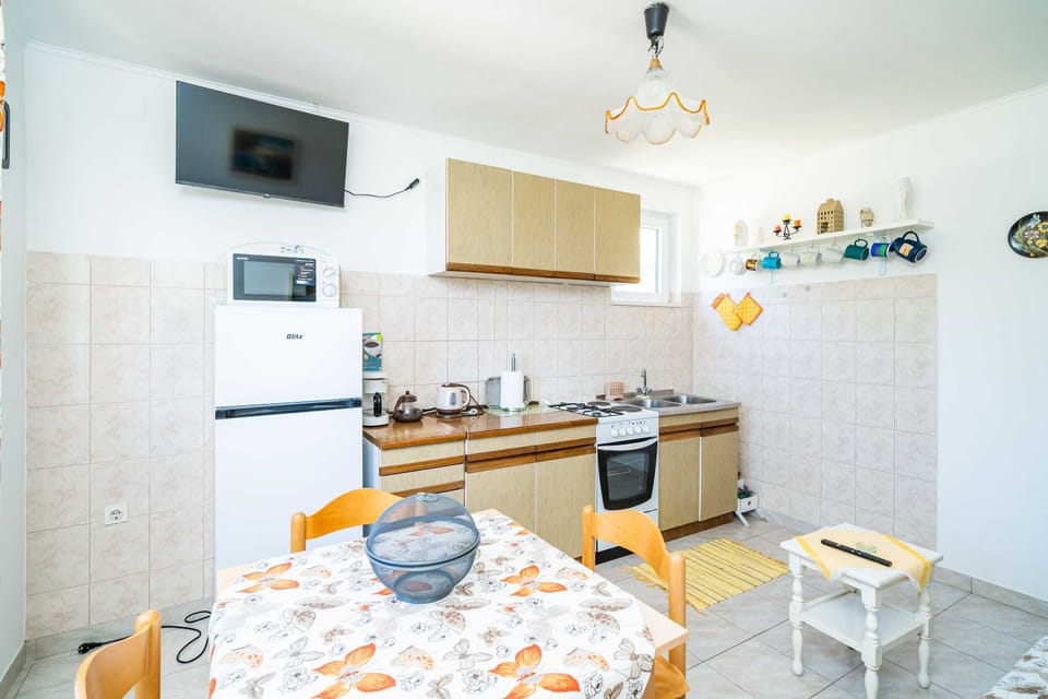 Apartment (Three Bedroom Apartment) | Private kitchen | Fridge