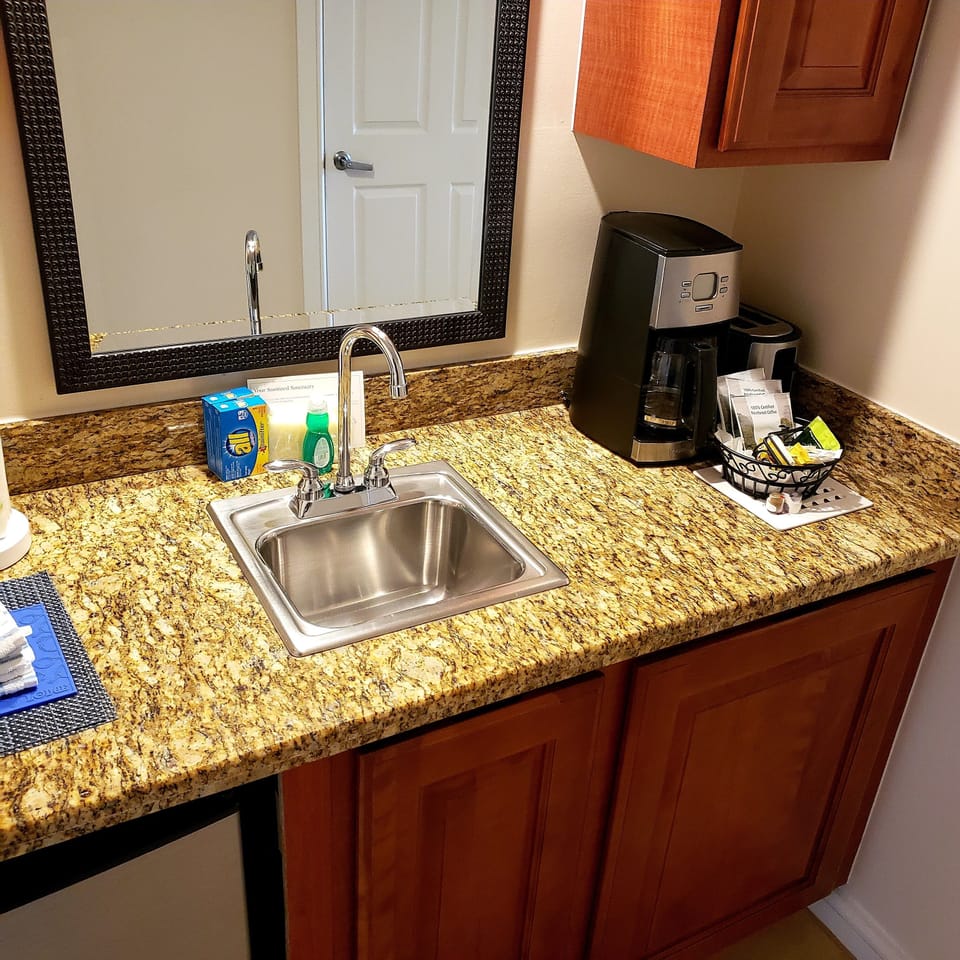 Kitchenette has small sink with mirror...extra sink is quite handy.