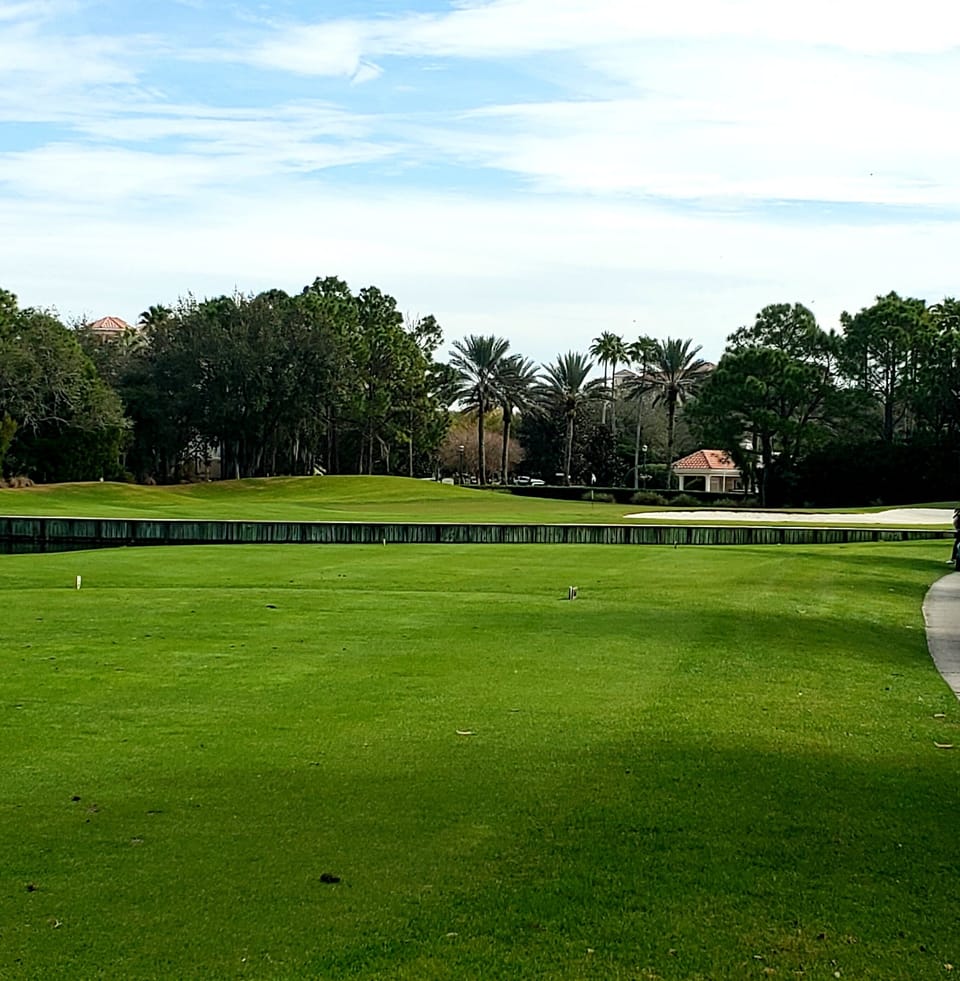 Hole four is a shot across the lake to a large green.