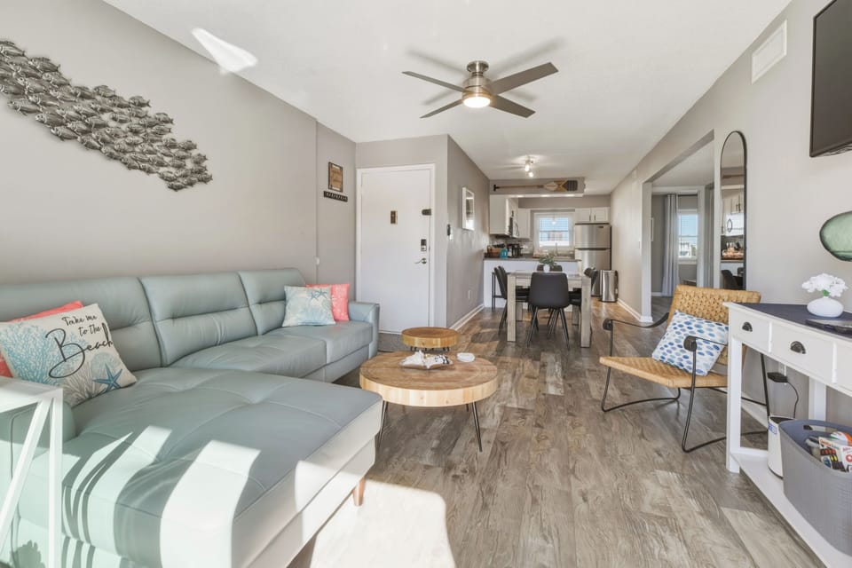 Light living room with a new leather sectional