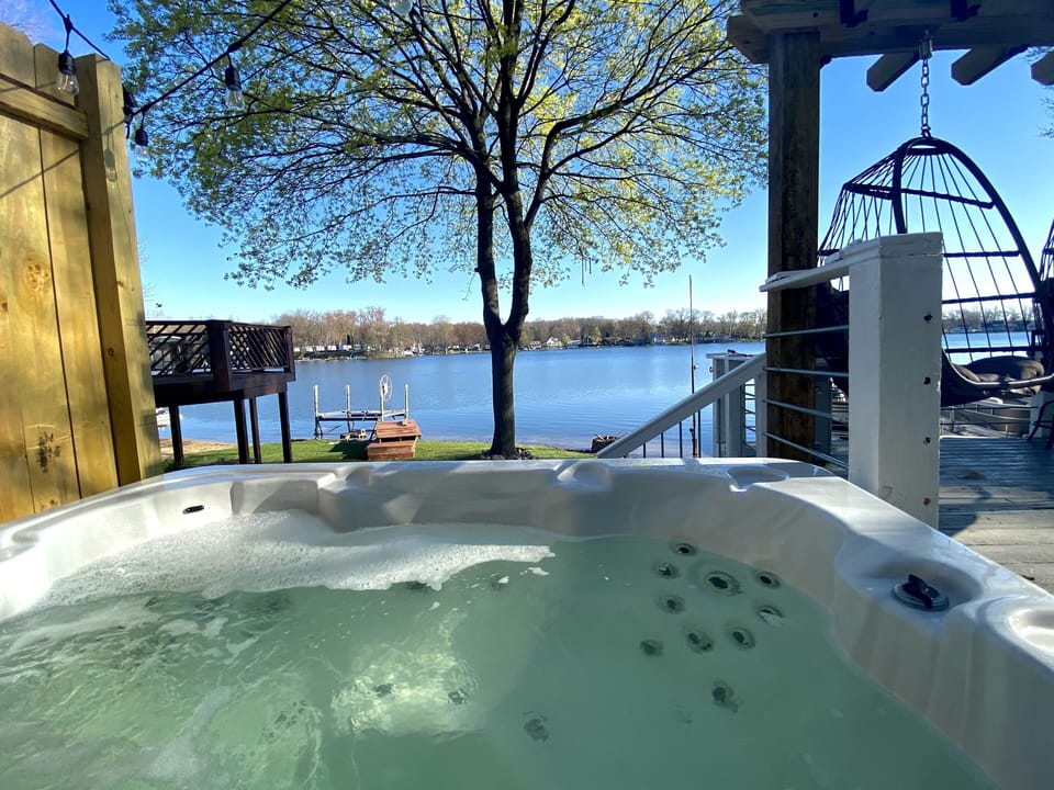 6 person hot tub with a gorgeous view of the lake 