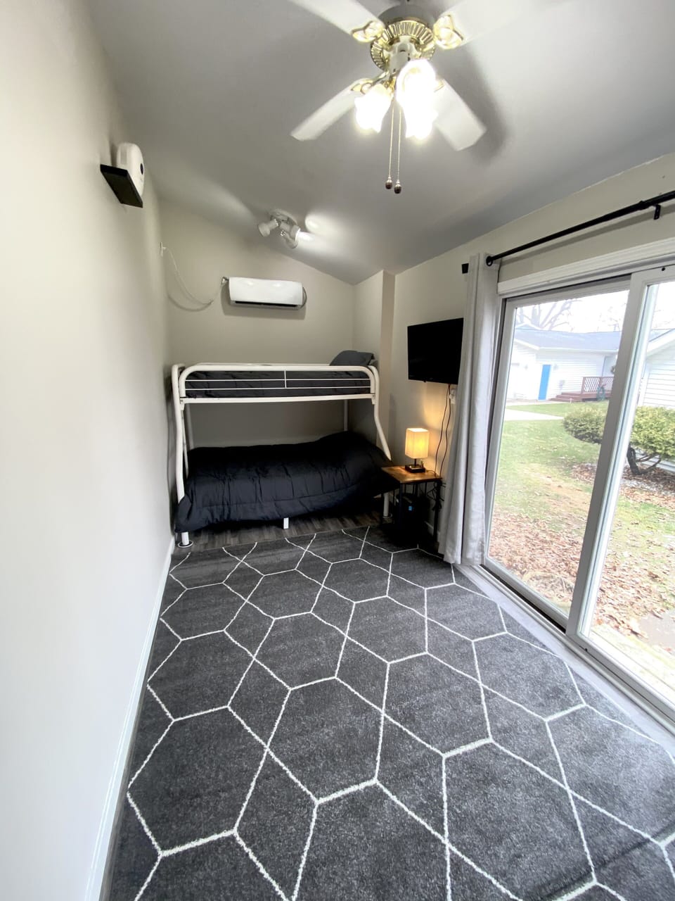 Detached Bunk room offers two twin-over-full bunk beds for additional guests