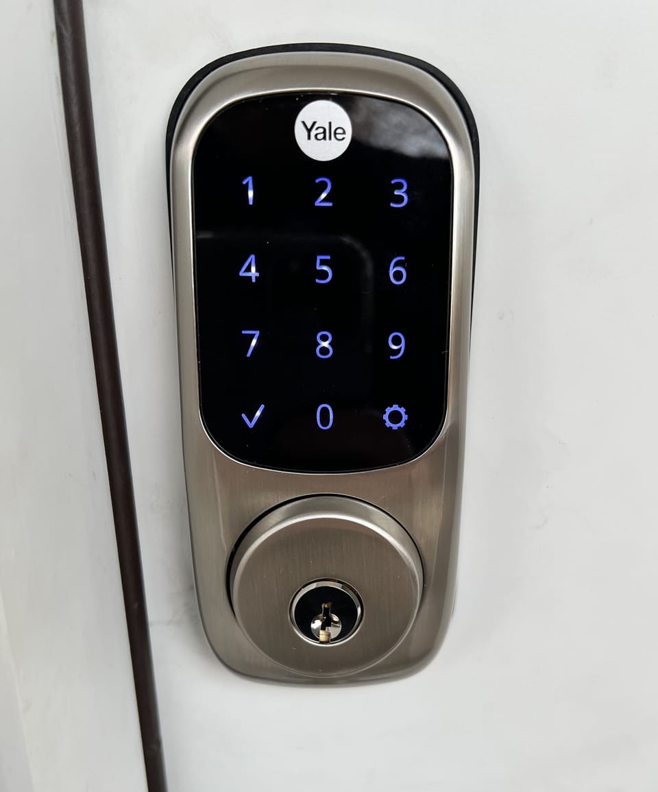 Smart lock with keypad.  You get your own code that only works during the stay
