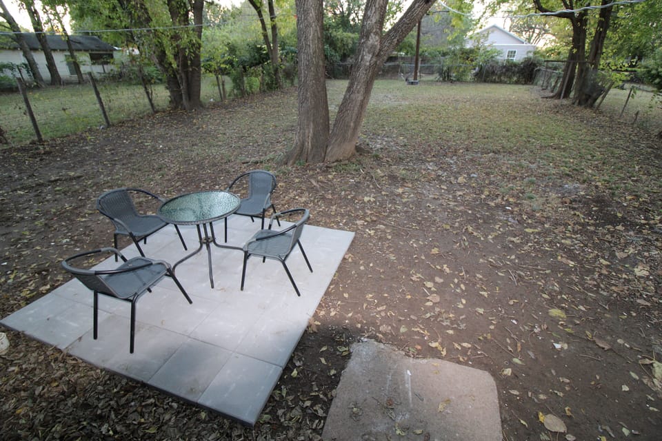 Large backyard with patio area