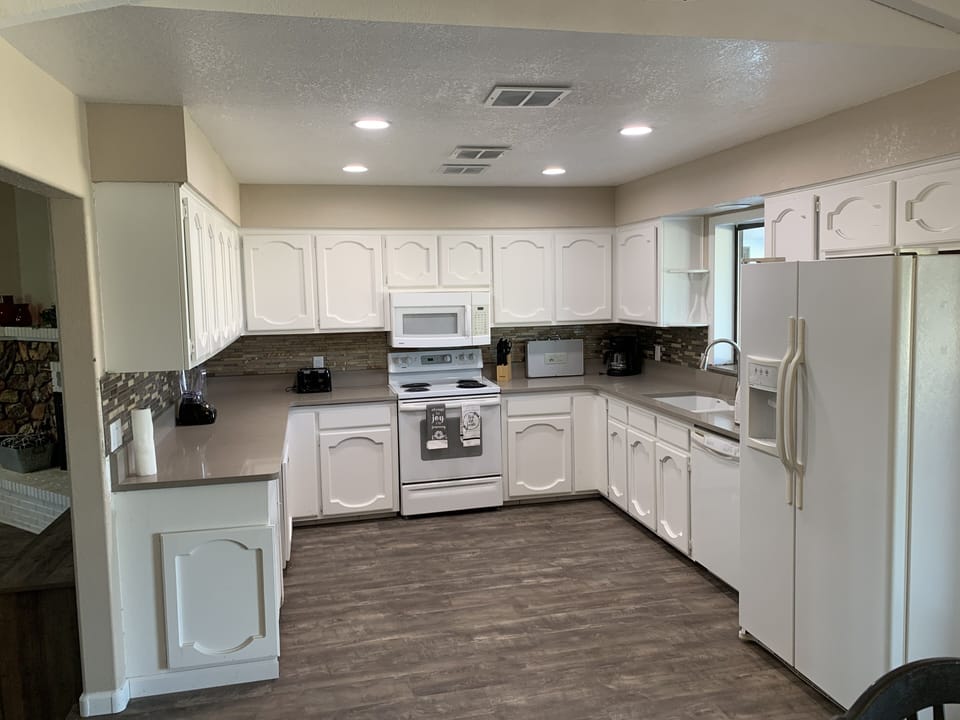 Large open kitchen with all the utensils needed for a large meal or just snacks.