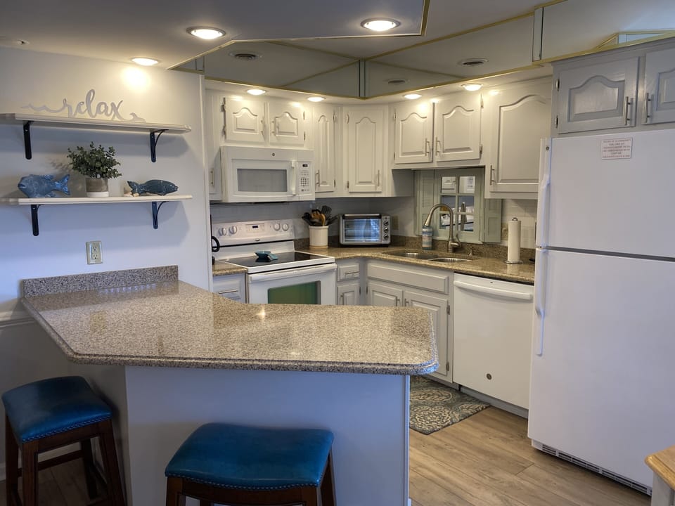 Condo, 3 Bedrooms | Private kitchen | Fridge, microwave, dishwasher, coffee/tea maker
