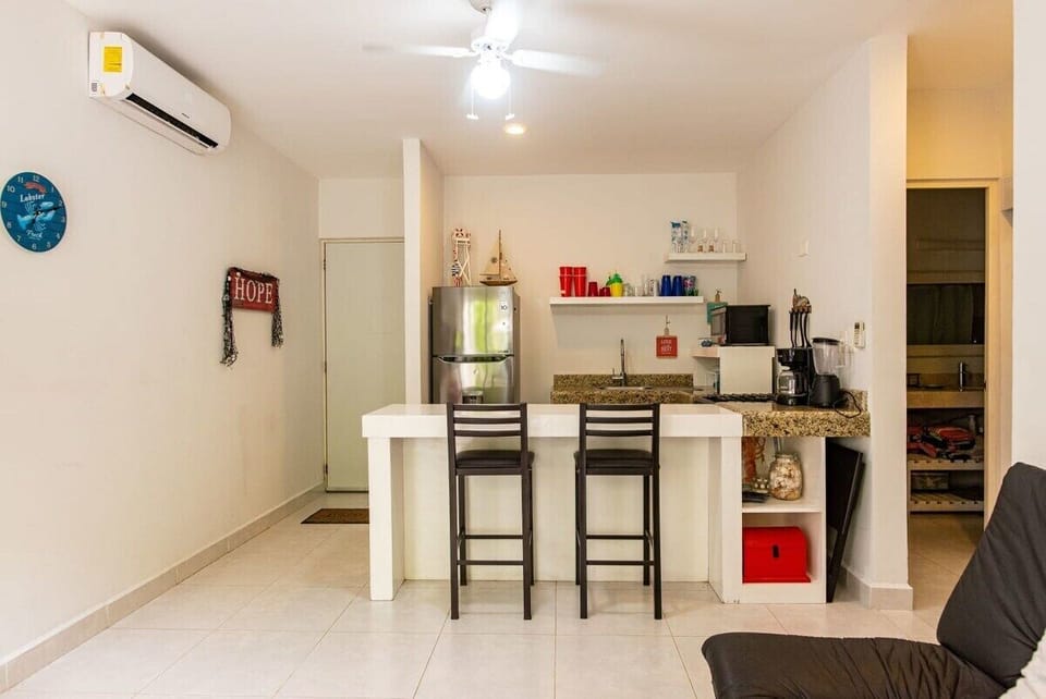 A spacious living-room, with an open kitchen concept for more air and light flow.