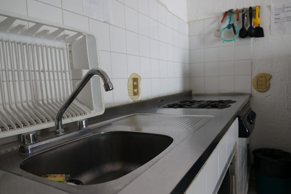 Superior Room | Private kitchen | Fridge, stovetop