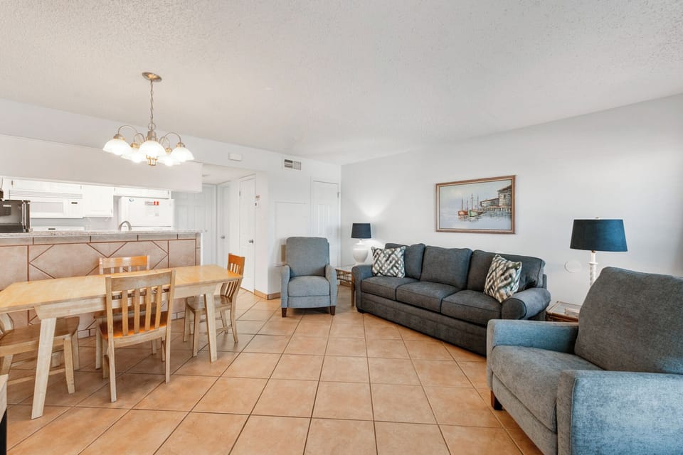 Relax in your bright, open living space with comfortable seating and a dining area perfect for family meals and conversations.