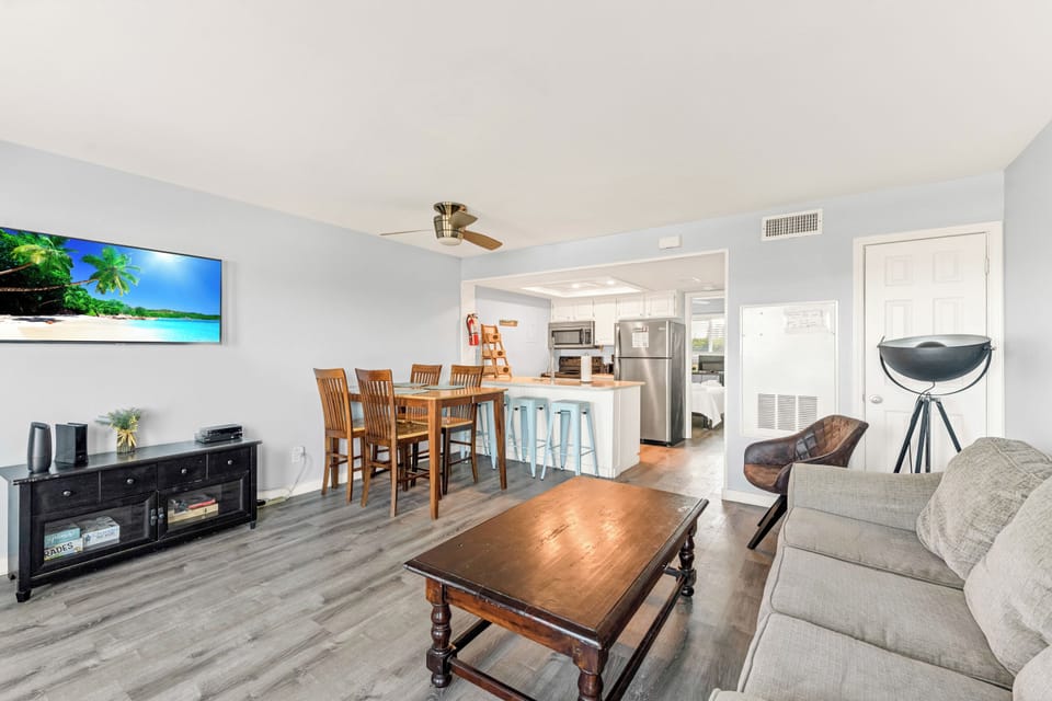 Settle into your spacious open-concept retreat where the living room flows seamlessly into the modern kitchen, perfect for entertaining.