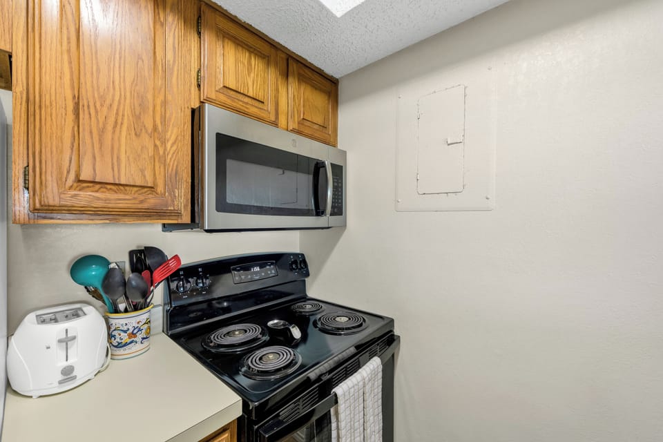 Your fully equipped kitchen awaits with everything needed to prepare home-cooked meals during your stay.