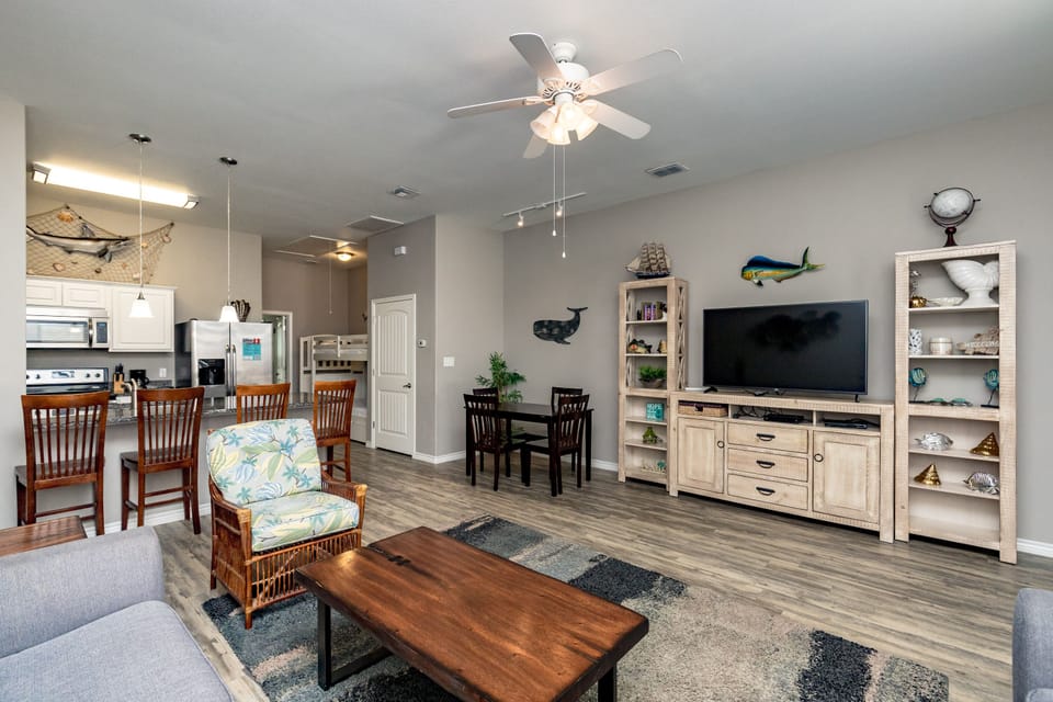 Relax in your spacious open-concept retreat featuring coastal charm, modern comforts, and nautical touches throughout your home away from home.