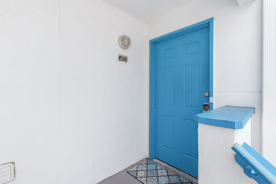 Front door with coded lock for added security.