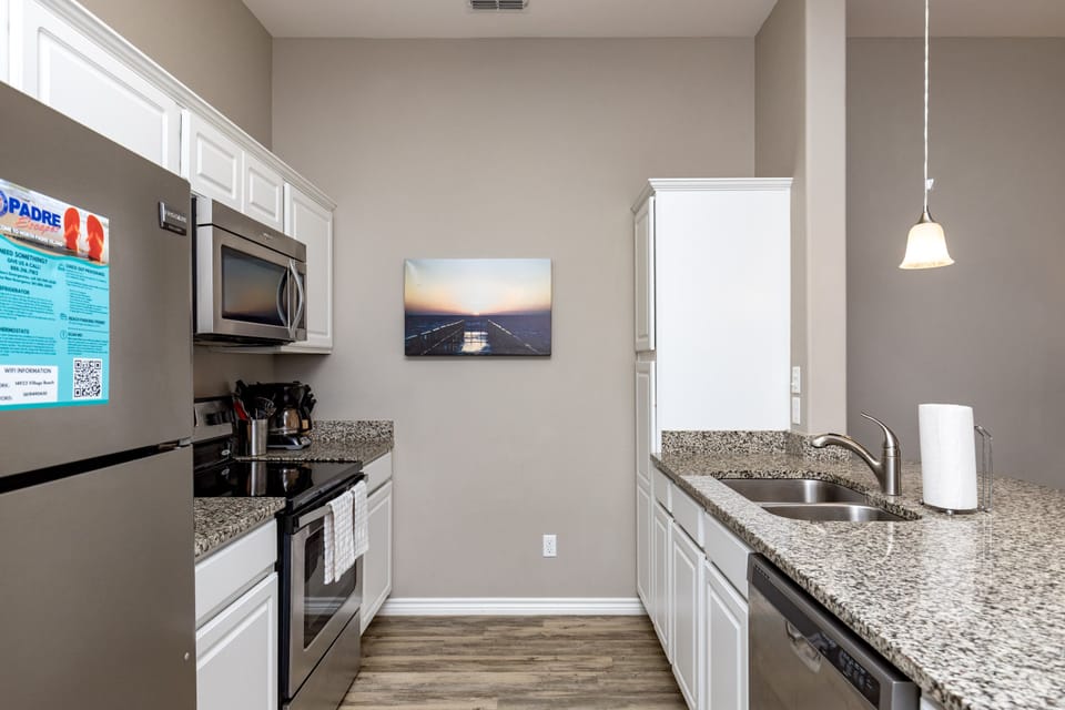 Your fully equipped kitchen features granite countertops, stainless steel appliances, and everything you need to create delicious meals during your stay.