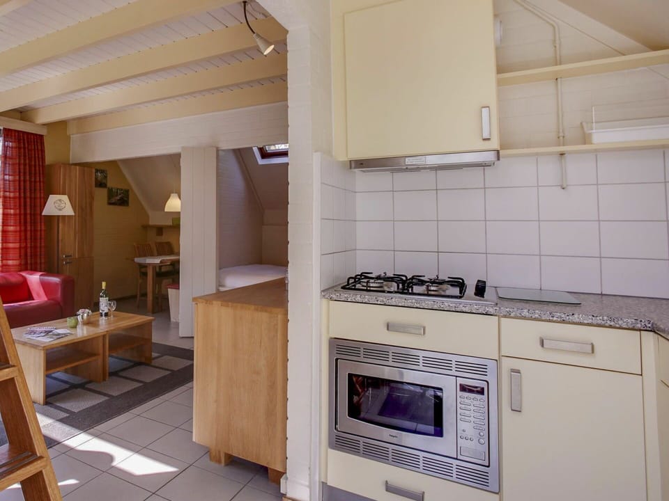 Cabinetry, Furniture, Property, Countertop, Building, Kitchen Appliance, Kitchen Stove, Kitchen, Home Appliance, Cooktop