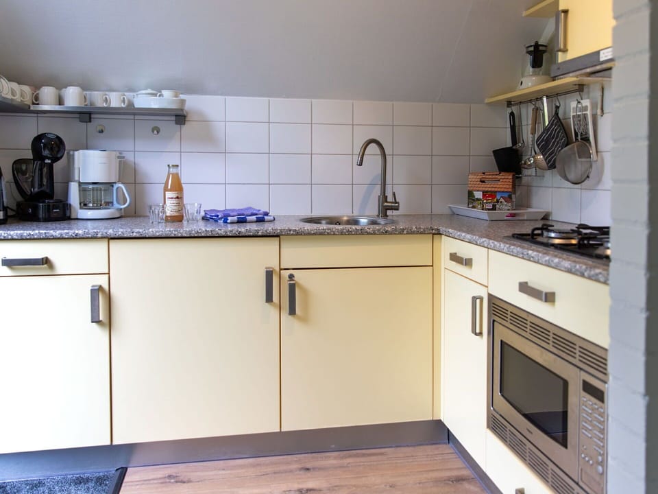 Countertop, Kitchen Sink, Cabinetry, Property, Sink, Tap, Kitchen Appliance, Kitchen, Kitchen Stove, Home Appliance