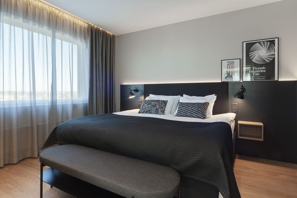 Suite, 1 Bedroom (Living Area) | Minibar, in-room safe, individually furnished, desk