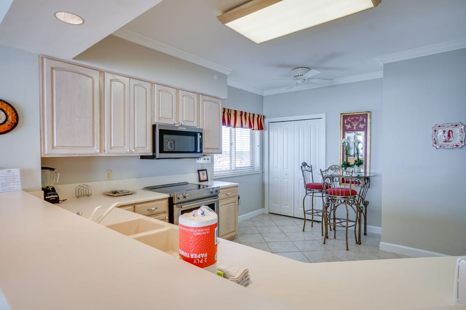 You'll love preparing meals in this fully-equipped kitchen with modern appliances and charming breakfast nook for morning coffee.