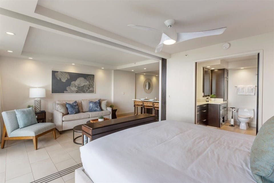 Primary bedroom and living area