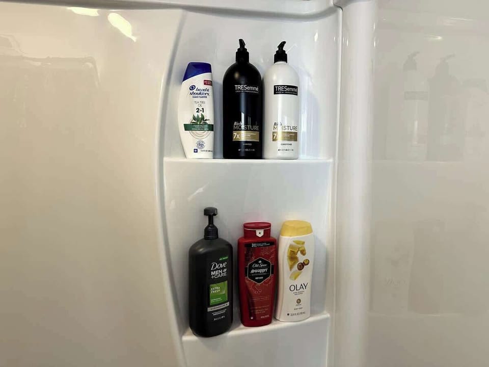 Bathroom shelf with organized toiletries