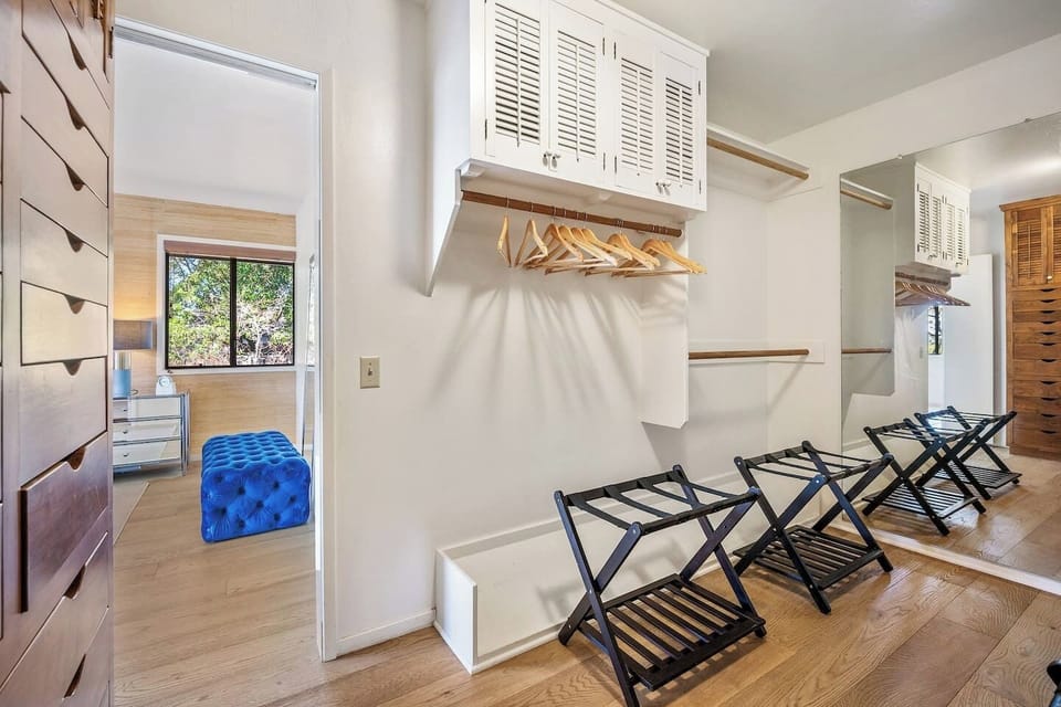 Primary suite large walk-in closet.