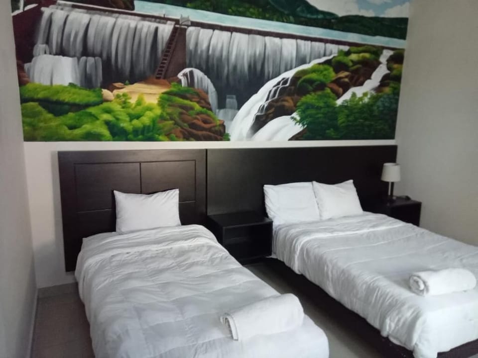 Family Studio Suite | Down comforters, individually decorated, individually furnished
