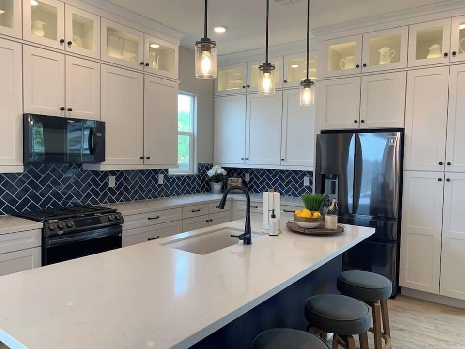 Oversized kitchen island and gorgeous cabinetry