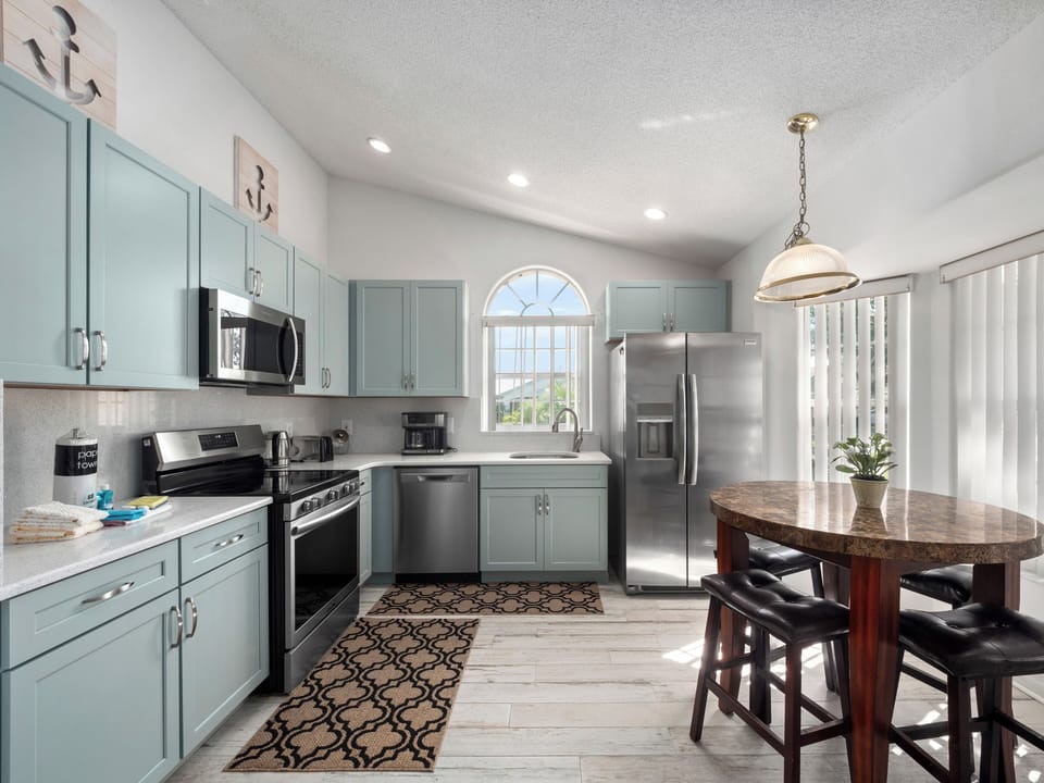 Gorgeous Kitchen with Basic Kitchen Starter Essentials and Breakfast Table