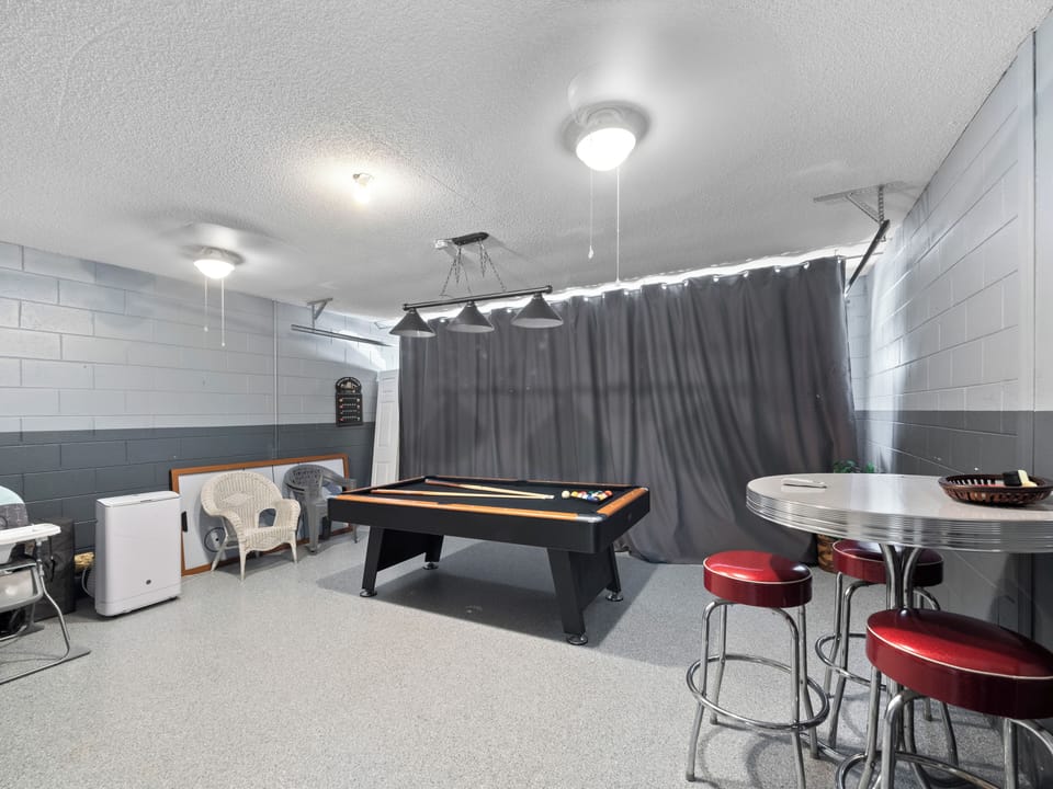 Game Room Garage with Pool Table and Comfortable Seating