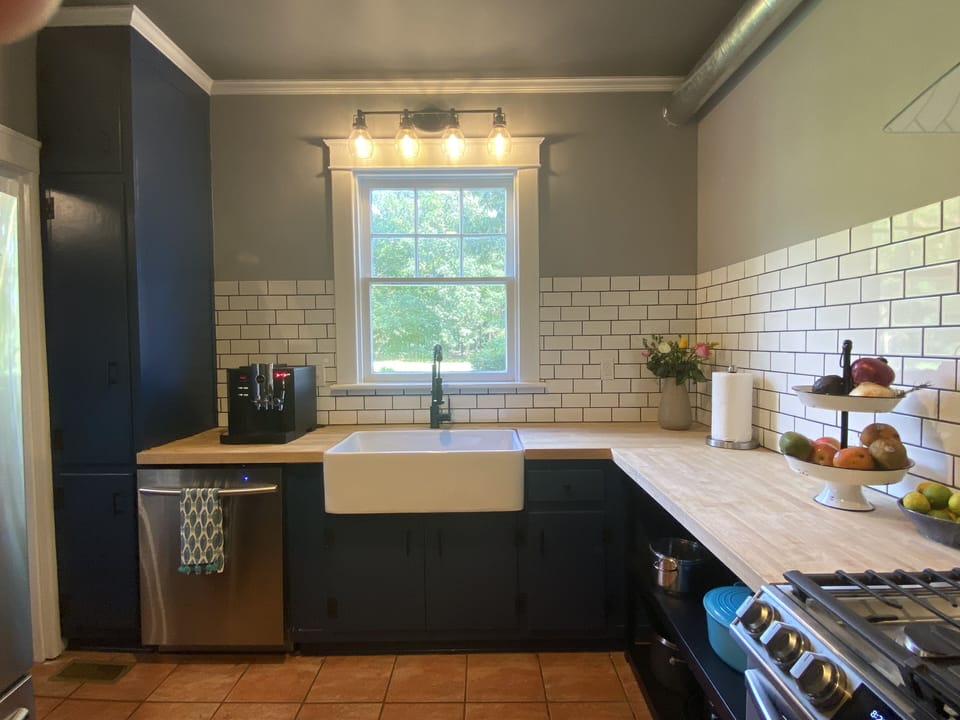 Well equipped farmhouse kitchen with all new stainless steel appliances 
