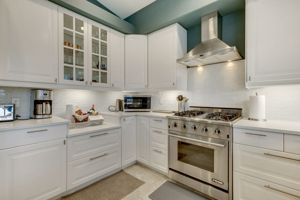 Gourmet kitchen includes herbs, spices, oil, tea, coffee, etc.
