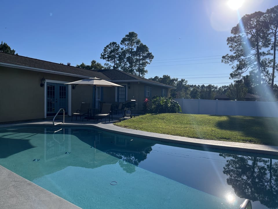 Private heated pool & fenced yard—great for families, pets, and beach days.