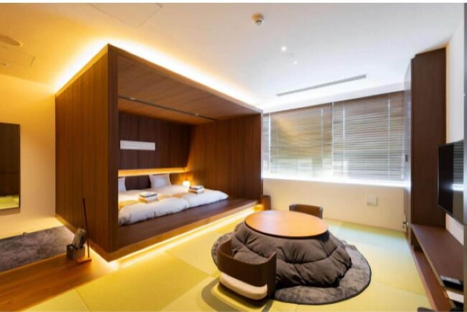 Premium Room A (Shared Bathroom), Non Smoking | Down comforters, in-room safe, blackout drapes, iron/ironing board