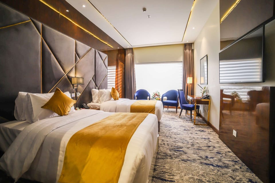 Executive Room, 2 Twin Beds, Non Smoking | Minibar, in-room safe, individually decorated, desk