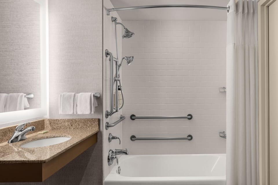 Combined shower/tub, eco-friendly toiletries, hair dryer, towels