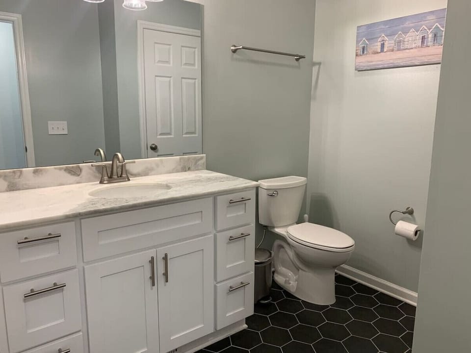The bathroom on the main floor has a tiled shower as well!