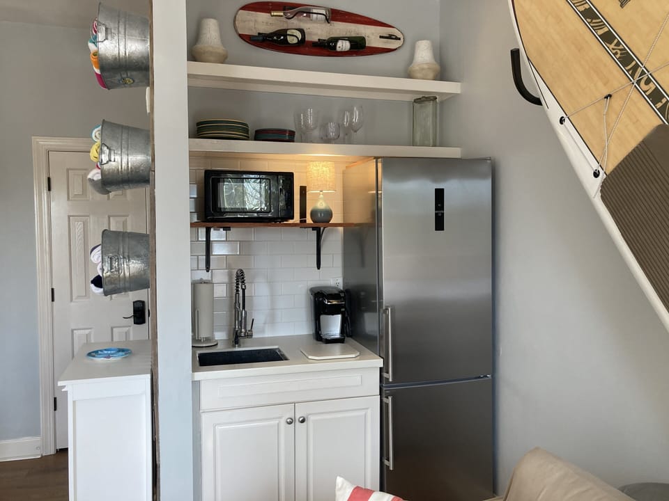 Refrigerator, Coffee (K-cups) & microwave. Dishes, utensils & full sized sink. 